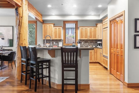 Kitchen with barstool seating.
