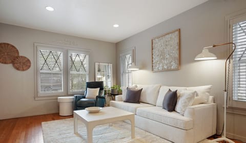 Large and beautiful living room with brand new sleeper sofa and smart tv