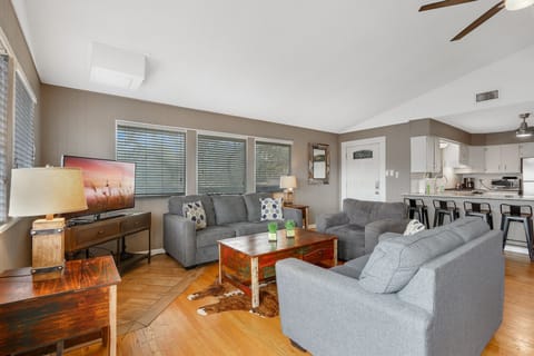 Alternate view of the living room looking back at the entry door.