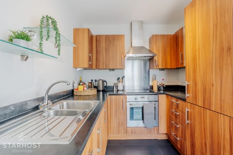 The kitchen is fully equipped with integrated appliances inc dishwasher
