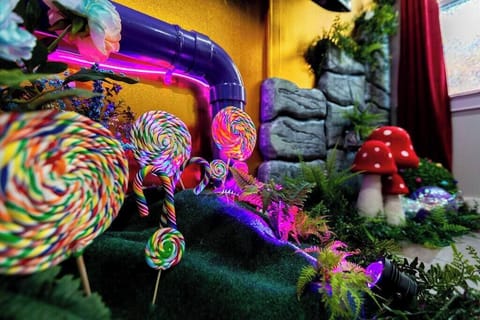 Enchanting corner adorned with a plethora of full-color lollipops, adding a sweet touch to the atmosphere in every corner.