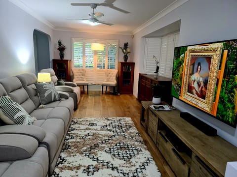 Lounge room with recliners that you'll really want to come home to. 
