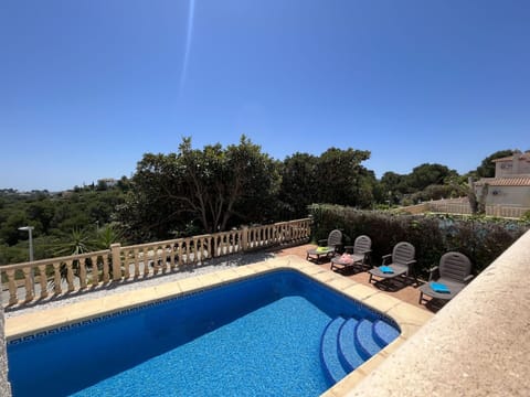 Building, Property, Sky, Light, Azure, Swimming Pool, Plant, Window, Shade, Tree