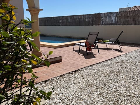 Building, Property, Sky, Light, Azure, Swimming Pool, Plant, Window, Shade, Tree