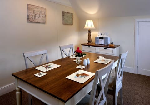 Penthouse Apartment Dining Room with views towards North Hill and Exmoor