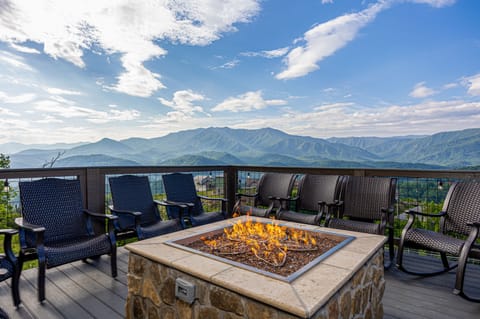 Sit by the gas firepit on the lower deck & take in the views!