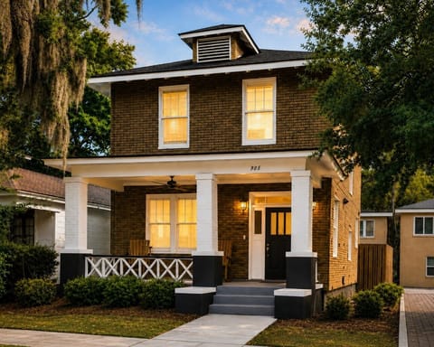 Welcome home to classic Savannah charm, featuring a beautiful brick exterior, inviting front porch, and warm Southern character.