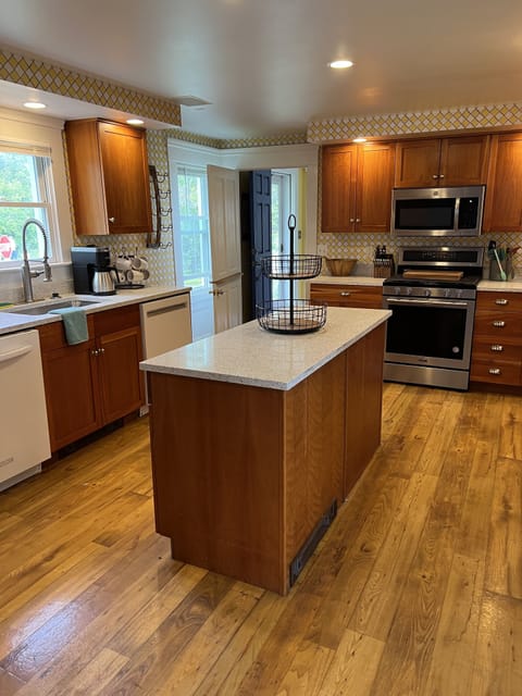 Fully appointed kitchen, 2-DW, 2-gas ranges, 2-refrigerators.