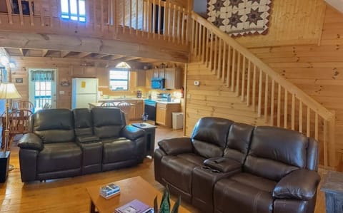 Open concept living room/kitchen/dining space. 