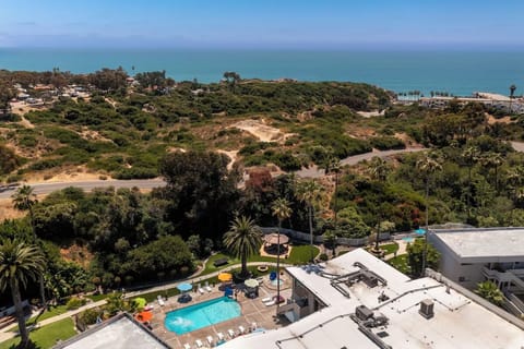 Arrive to a relaxed resort setting surrounded by lush grounds.