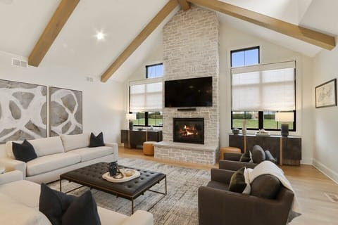 Living Room with gas fireplace and smart TV