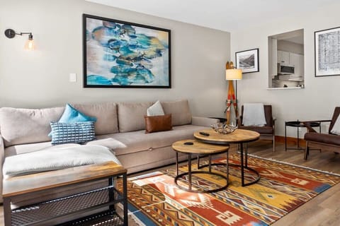 The living room is a well-designed space offering an inviting and cozy common area for relaxing with your loved ones.