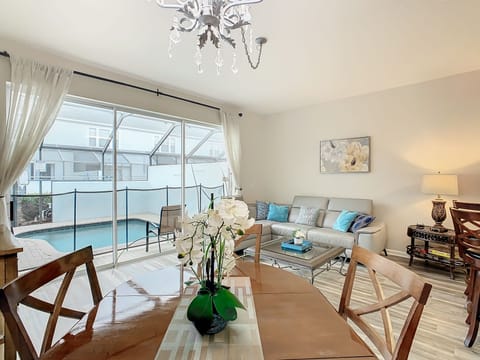 Dining room open concept kitchen 1st floor exiting to a private enclosed pool