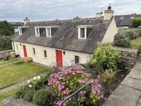 The cottages are in pairs - there are two pairs facing each other