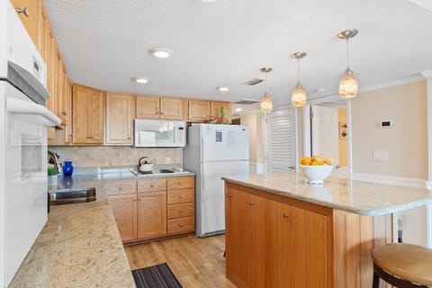 Large Kitchen Area, With Washer/Dryer in Condo and Full Sized Appliances!