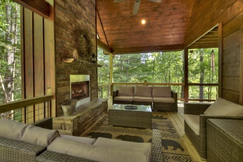 Enjoy the feel of sitting in a treehouse while visiting the Papa Bear Lodge cabin rental in Blue Ridge 