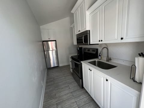 Full-size fully equipped kitchen