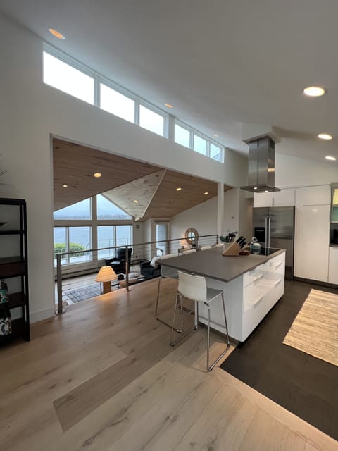 View from dining area to kitchen and living room.