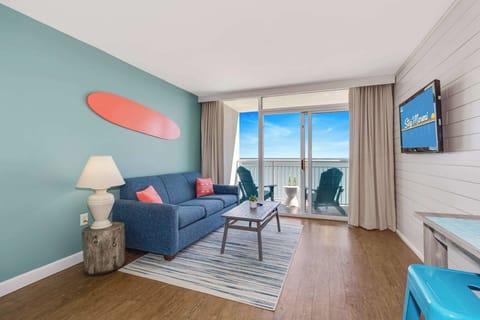 Experience coastal bliss in this vibrant, ocean-view retreat! Featuring a stylish surf-inspired décor, comfy seating, and a spacious balcony with breathtaking views, it’s the perfect getaway to relax and soak up the sun.