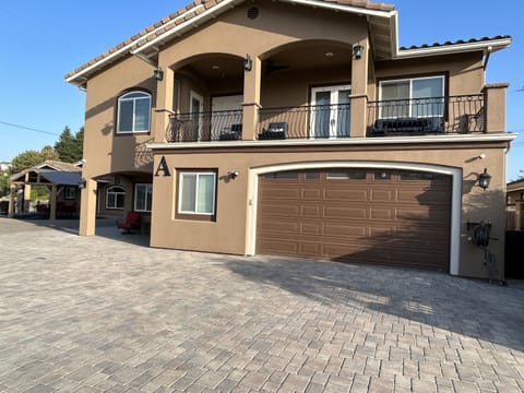 Main house with 4 bedrooms, 3 baths, 2 sleeper sofas and a Murphy bed.  Covered hot tub, BBQs and hibachi grill