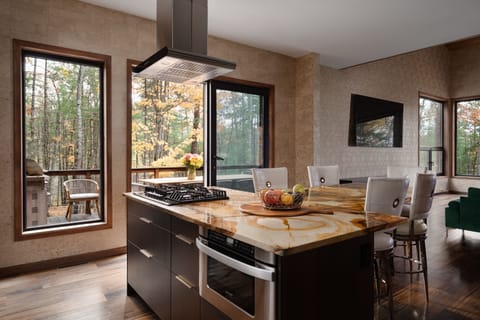 can watch the tv or communicate with others on the porch right from the kitchen