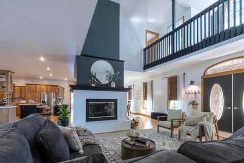 Curl up in front of the beautiful fireplace and read your favorite book.