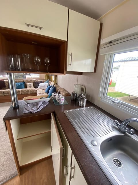 Cozy kitchen with scenic window views and modern amenities