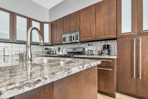 Living Room / Dining Room combo with fully stocked kitchen
