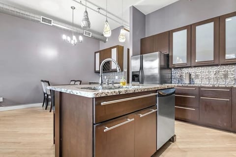 Living Room / Dining Room combo with fully stocked kitchen