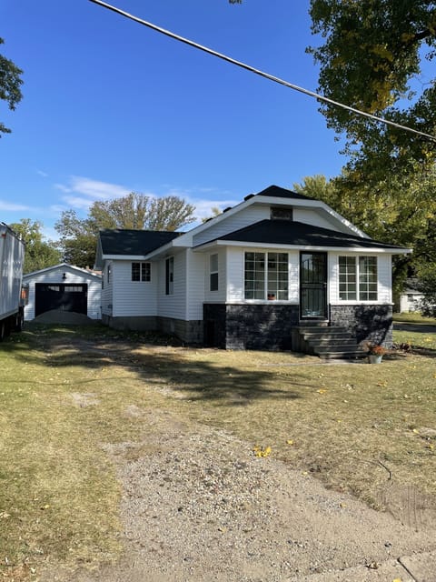 Freshly renovated exterior with a large driveway for your big rig and plug-ins.