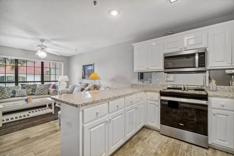 Fully Stocked Kitchen with Bar Seating