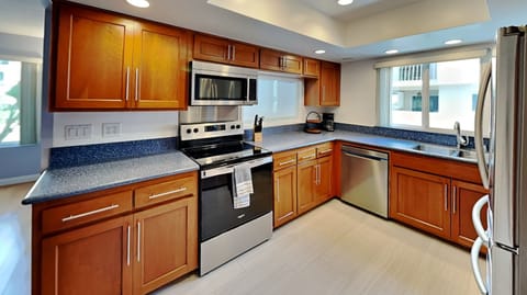 Large Spacious Kitchen, endless  countertop space, and updated appliances.