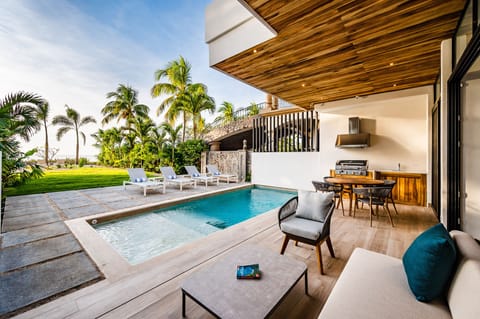 Pool deck overlooks the ocean 