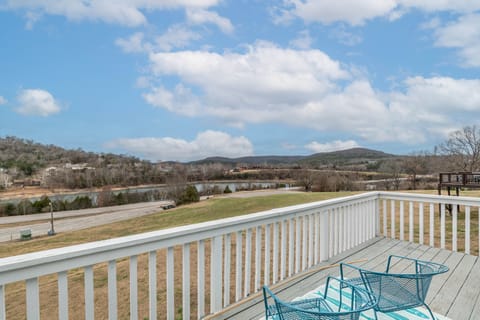 Deck with lake and meadow views, marina to the right. Propane grill 