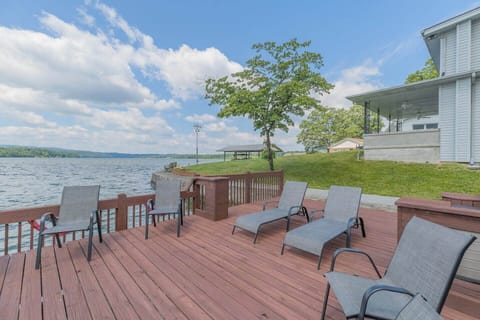 Dock seating where you will relax and sunbathe just steps from the front patio