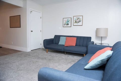 Living room with 2 fold down sofas.