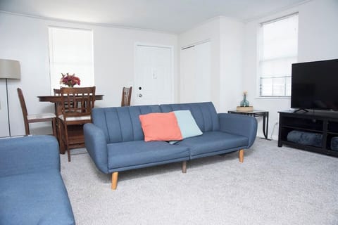 Living room with 2 fold down sofas.