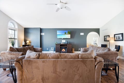 An electric fireplace makes for a cozy evening.