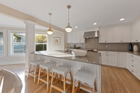Modern kitchen with large island and seating for 4