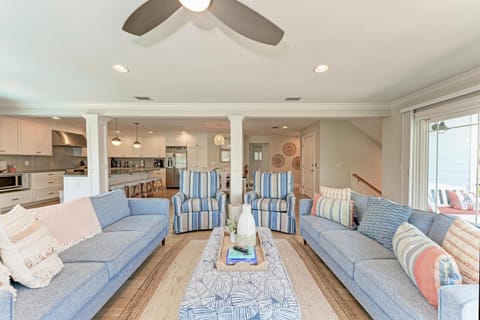 View of living room looking toward dining and kitchen area