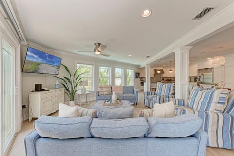 Large living room boasts two sofas and chairs