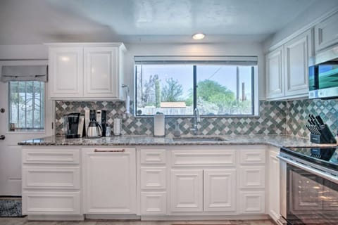 Enjoy the mountain views from the kitchen window. Extremely well stocked kitchen for the most discerning cook. Perfect triangle of access for ease of baking and cooking.