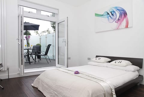 Master bedroom with access to balcony