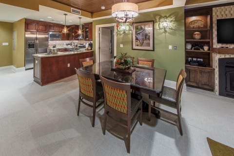 Enjoy a meal at the dining table.