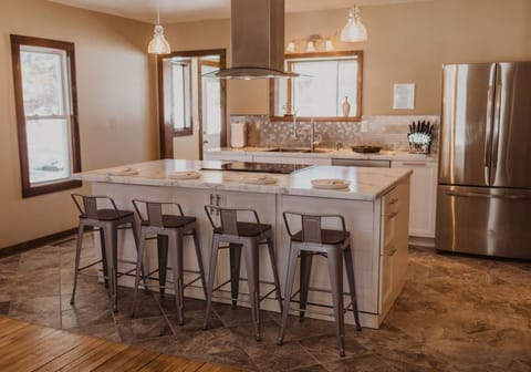 Spend time in the spacious kitchen and dining area sharing memories.