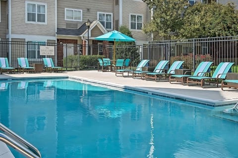 Dive into sparkling pool days with plenty of loungers.