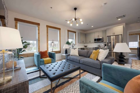 Embrace the comfort and sophistication of our modern living room setup, complete with comfortable couches and a trendy coffee table - the ideal setting for making memories with family and friends.
