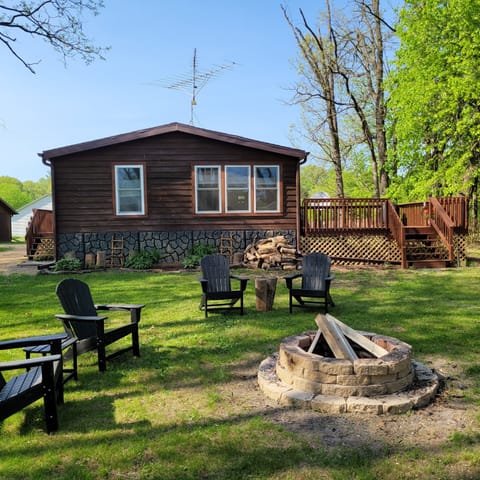 Back yard with firepit and lake entrance
