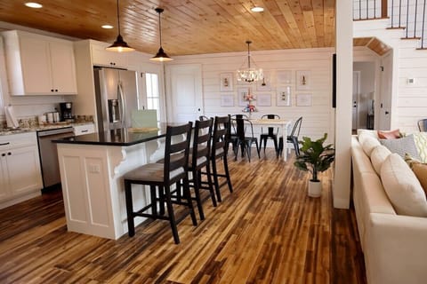 Kitchen with bar top counter, seating for 9 people