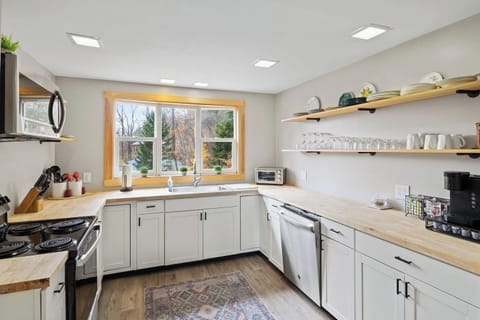 Our kitchen is designed with both form and function in mind - you'll love the stylish decor and ample counter space.